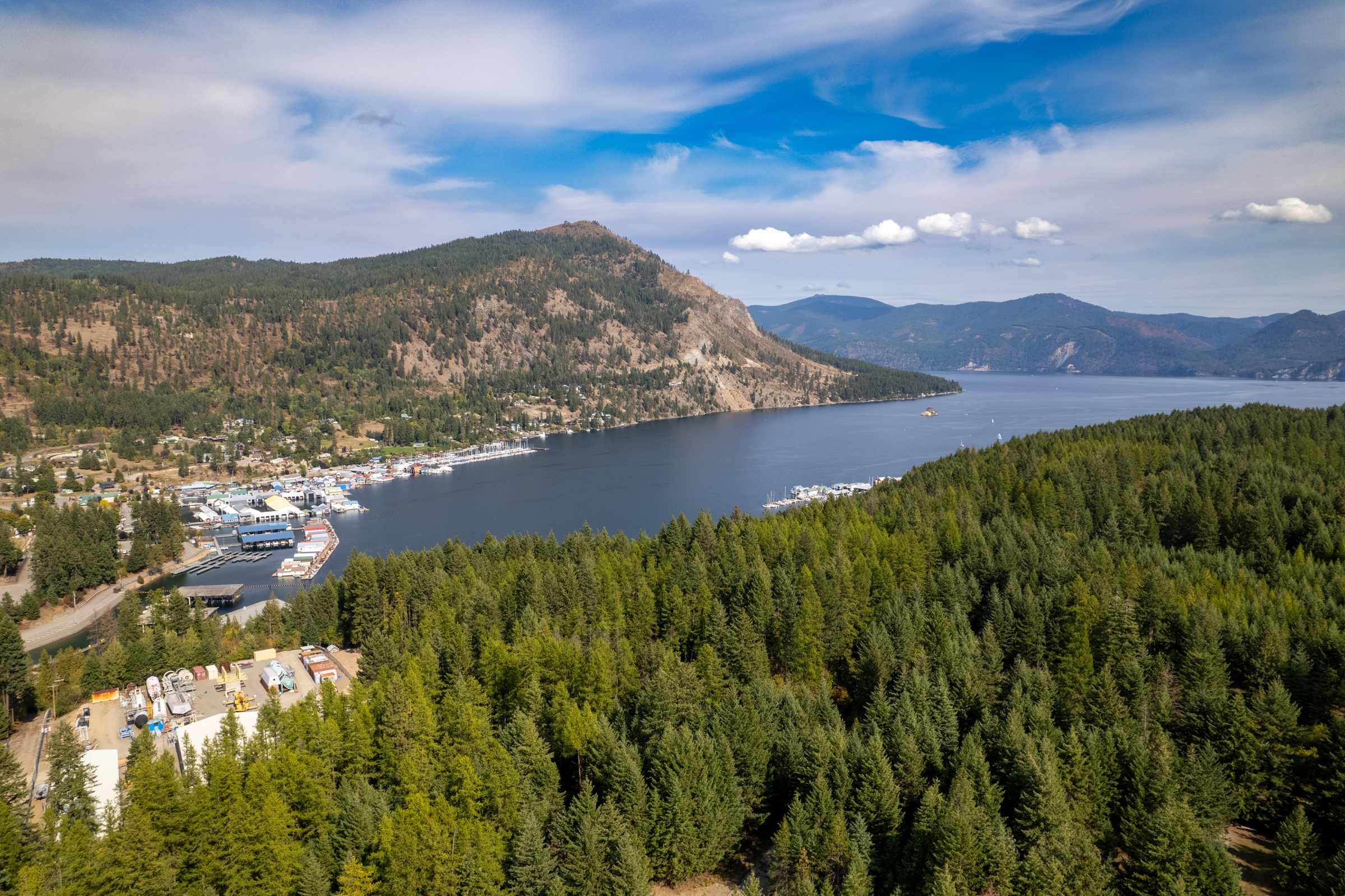 Bayview lake and marina with a mountain peak, Jeremy Kitchen